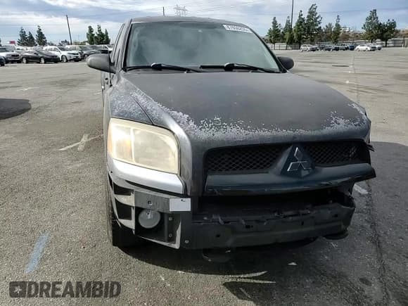 ✅ 2006 Mitsubishi Raider Duro Cross • VIN: 1Z7HC32KX6S537759 • Лот: 87650255. Опубликован ранее на Copart с пробегом 125 679 миль. Бесплатный доступ к архиву аукционных продаж из США и подробный отчёт об истории автомобиля на DreamBid. Изображение 11.