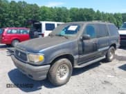 ✅ 1998 Mercury Mountaineer • VIN: 4M2ZU52E9WUJ40013 • Lot: 42560709. Listed on IAAI with 165,807 mi. Free auction sales archive from the USA and detailed vehicle history report at DreamBid. Image 2.