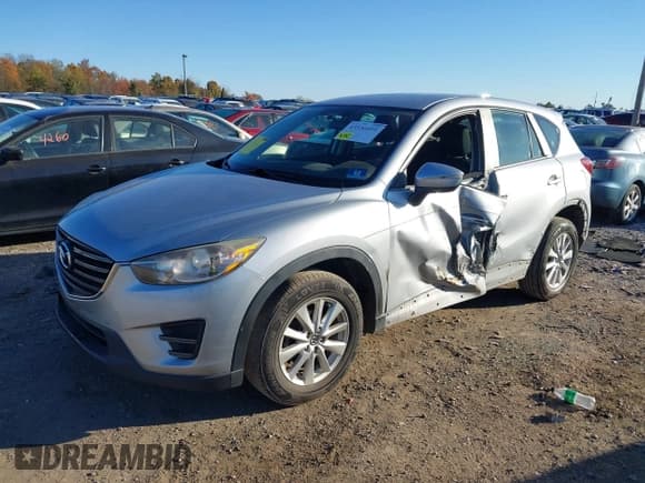 ✅ 2016 Mazda CX-5 Sport • VIN: JM3KE4BY2G0754412 • Lot: 43536491. Wystawiony na IAAI z przebiegiem 186 674 mil. Bezpłatny archiwum sprzedaży aukcyjnych z USA i szczegółowy raport historii pojazdu na DreamBid. Zdjęcie 2.