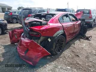 2019 Dodge Charger Scat Pack z VIN 2C3CDXGJ1KH580838, wystawiony jako IAAI lot #43315471 z przebiegiem 42 201 mil mil oraz . Historia ofert i sprzedaży dostępna na DreamBid. Obrazek 4.