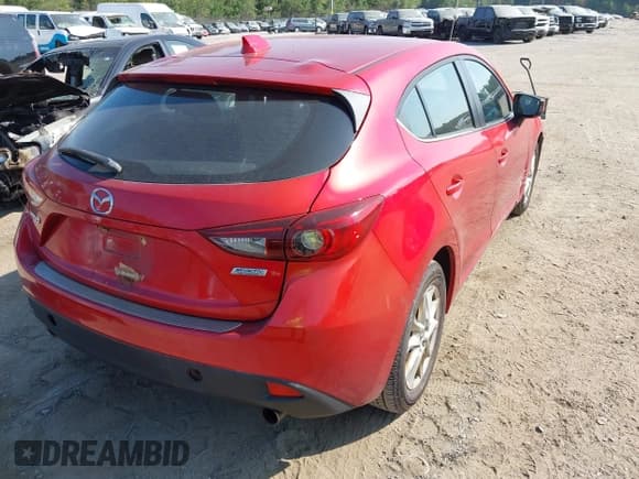 ✅ 2014 Mazda 3 i Grand Touring • VIN: JM1BM1M77E1183909 • Lot: 42975093. Wystawiony na IAAI z przebiegiem 187 123 mil. Bezpłatny archiwum sprzedaży aukcyjnych z USA i szczegółowy raport historii pojazdu na DreamBid. Zdjęcie 4.