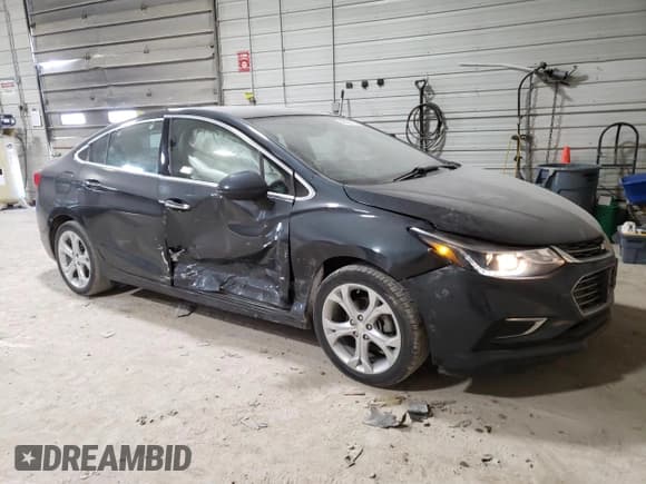✅ 2018 Chevrolet Cruze Premier • VIN: 1G1BF5SM2J7185111 • Lot: 46123173. Listed on Copart with 117,144 mi. Free auction sales archive from the USA and detailed vehicle history report at DreamBid. Image 4.