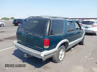 ✅ 1997 Chevrolet Blazer LS • VIN: 1GNDT13W7V2119309 • Lot: 39621303. Wystawiony na IAAI z przebiegiem Nie podano. Bezpłatny archiwum sprzedaży aukcyjnych z USA i szczegółowy raport historii pojazdu na DreamBid. Zdjęcie 4.