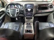 ✅ 2014 Chrysler Town & Country Touring L • VIN: 2C4RC1CG0ER461032 • Lot: 81019235. Listed on Copart with 136,384 mi. Free auction sales archive from the USA and detailed vehicle history report at DreamBid. Image 8.