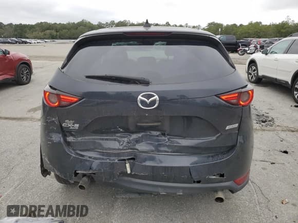 ✅ 2019 Mazda CX-5 Grand Touring • VIN: JM3KFBDM9K0549030 • Лот: 82774585. Опубликован ранее на Copart с пробегом 74 307 миль. Бесплатный доступ к архиву аукционных продаж из США и подробный отчёт об истории автомобиля на DreamBid. Изображение 6.