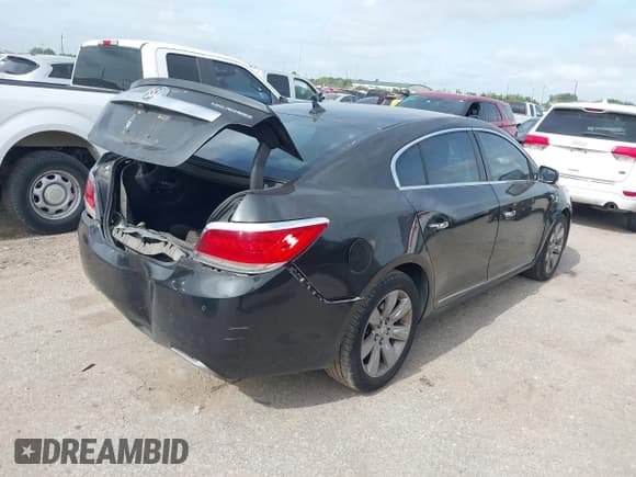 ✅ 2013 Buick LaCrosse Premium 2 • VIN: 1G4GH5G34DF281769 • Lot: 42753114. Wystawiony na IAAI z przebiegiem 245 724 mil. Bezpłatny archiwum sprzedaży aukcyjnych z USA i szczegółowy raport historii pojazdu na DreamBid. Zdjęcie 4.