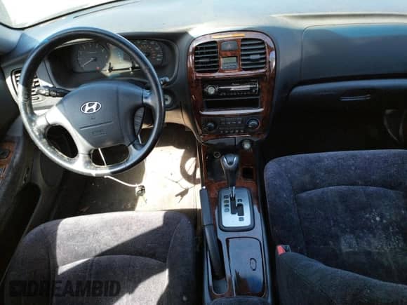 2002 Hyundai Sonata GLS с VIN KMHWF35H12A702457, выставлен на аукционе Copart как лот 60985574 с пробегом 99 698 миль миль и Списание • Salvage title. История ставок и продаж доступна на DreamBid. Изображение 8.