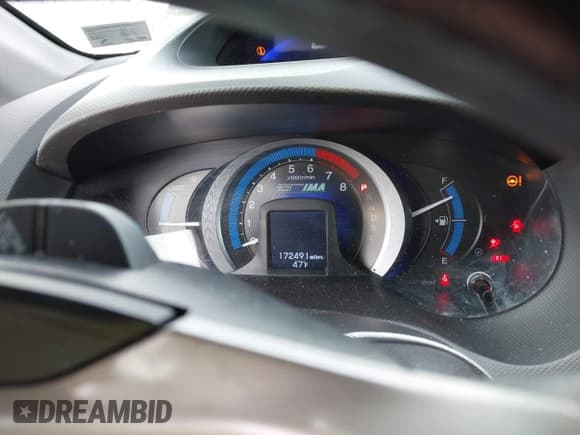 ✅ 2011 Honda Insight LX • VIN: JHMZE2H52BS009826 • Лот: 43724404. Опубликован ранее на IAAI с пробегом 172 491 миль. Бесплатный доступ к архиву аукционных продаж из США и подробный отчёт об истории автомобиля на DreamBid. Изображение 7.