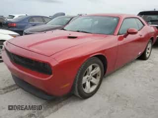 2012 Dodge Challenger SXT z VIN 2C3CDYAG9CH210824, wystawiony jako Copart lot #76201764 z przebiegiem 97 698 mil mil oraz Nie do naprawy • Non repairable. Historia ofert i sprzedaży dostępna na DreamBid. Obrazek 1.