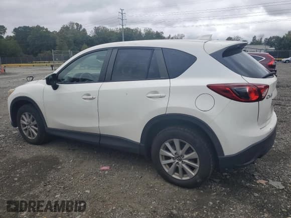✅ 2015 Mazda CX-5 Sport • VIN: JM3KE2BE8F0473515 • Лот: 86459275. Опубликован ранее на Copart с пробегом 140 890 миль. Бесплатный доступ к архиву аукционных продаж из США и подробный отчёт об истории автомобиля на DreamBid. Изображение 2.