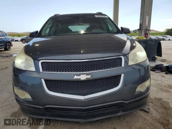 2009 Chevrolet Traverse LS z VIN 1GNER13D39S123297, wystawiony jako Copart lot #58504355 z przebiegiem Nie podano mil oraz Szkoda całkowita • Salvage title. Historia ofert i sprzedaży dostępna na DreamBid. Obrazek 5.