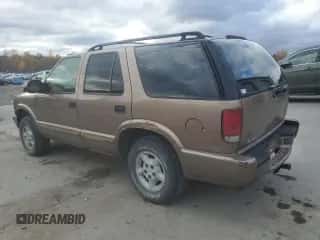 2004 Chevrolet Blazer LS z VIN 1GNDT13X24K123615, wystawiony jako Copart lot #77460534 z przebiegiem 133 079 mil mil oraz Szkoda całkowita • Salvage title. Historia ofert i sprzedaży dostępna na DreamBid. Obrazek 2.