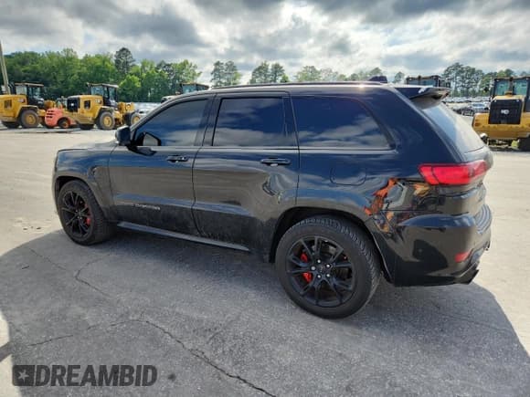 ✅ 2017 Jeep Grand Cherokee • VIN: NCS108376 • Lot: 57158405. Listed on Copart with 101,442 mi. Free auction sales archive from the USA and detailed vehicle history report at DreamBid. Image 2.