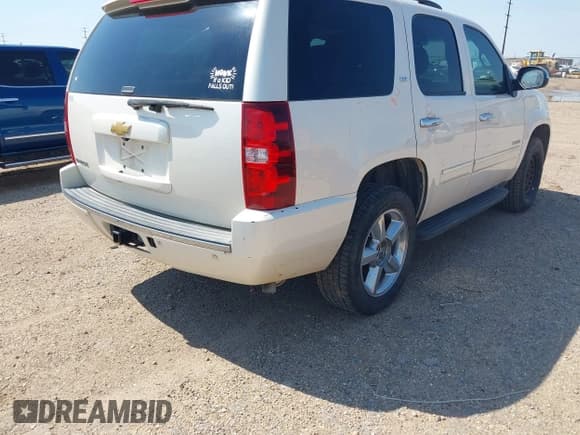 ✅ 2013 Chevrolet Tahoe LTZ • VIN: 1GNSKCE04DR331475 • Lot: 42897009. Listed on IAAI with 178,454 mi. Free auction sales archive from the USA and detailed vehicle history report at DreamBid. Image 4.