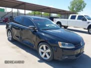 ✅ 2012 Volkswagen Jetta TDI w/Premium & Nav • VIN: 3VWLL7AJ0CM410008 • Lot: 43011566. Listed on IAAI with 207,018 mi. Free auction sales archive from the USA and detailed vehicle history report at DreamBid. Image 1.