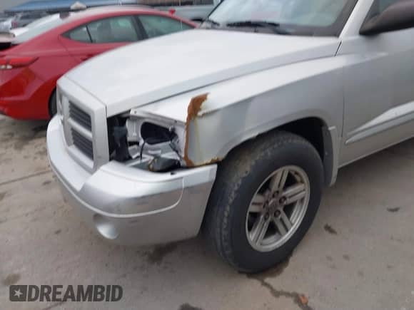2007 Dodge Dakota SLT with VIN 1D7HW48K77S129162, listed as a IAAI auction lot 41842077 with 186,172 mi miles and . Bid and sale history available at DreamBid. Image 6.