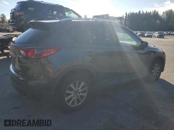 ✅ 2015 Mazda CX-5 Touring • VIN: JM3KE2CYXF0516051 • Lot: 84914825. Listed on Copart with 166,448 mi. Free auction sales archive from the USA and detailed vehicle history report at DreamBid. Image 3.