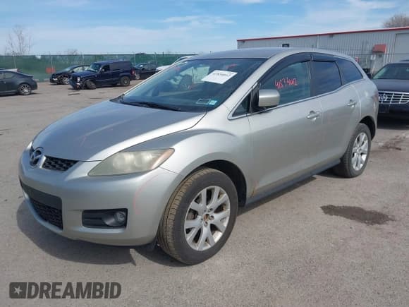 ✅ 2009 Mazda CX-7 Grand Touring • VIN: JM3ER29L890235402 • Lot: 41834012. Wystawiony na IAAI z przebiegiem 117 179 mil. Bezpłatny archiwum sprzedaży aukcyjnych z USA i szczegółowy raport historii pojazdu na DreamBid. Zdjęcie 2.