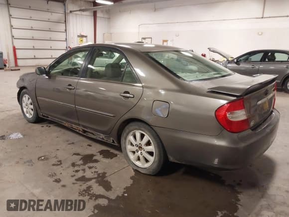 ✅ 2004 Toyota Camry XLE • VIN: 4T1BE32K74U790658 • Лот: 43116665. Опубликован ранее на IAAI с пробегом 246 808 миль. Бесплатный доступ к архиву аукционных продаж из США и подробный отчёт об истории автомобиля на DreamBid. Изображение 3.