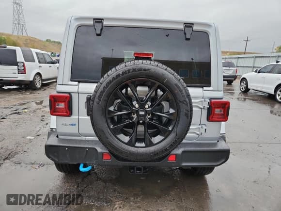 ✅ 2024 Jeep Wrangler Sahara • VIN: 1C4RJXP62RW146188 • Lot: 85575625. Listed on Copart with 32,765 mi. Free auction sales archive from the USA and detailed vehicle history report at DreamBid. Image 6.