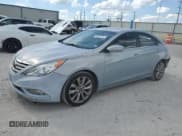✅ 2013 Hyundai Sonata SE • VIN: 5NPEC4ACXDH590889 • Lot: 69507154. Listed on Copart with 137,669 mi. Free auction sales archive from the USA and detailed vehicle history report at DreamBid. Image 1.