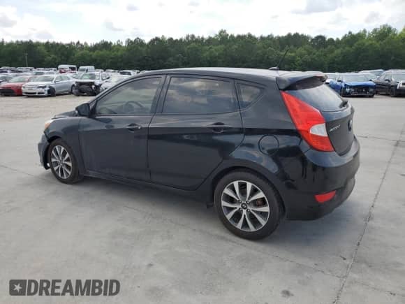 2017 Hyundai Accent Sport with VIN KMHCU5AE2HU354529, listed as a Copart auction lot 57215595 with Not provided miles and Salvage title. Bid and sale history available at DreamBid. Image 2.
