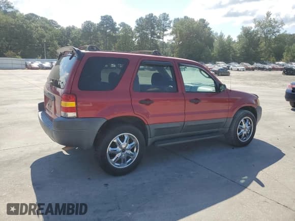✅ 2003 Ford Escape XLT Popular • VIN: 1FMYU03193KC16879 • Lot: 80380475. Listed on Copart with 253,867 mi. Free auction sales archive from the USA and detailed vehicle history report at DreamBid. Image 3.