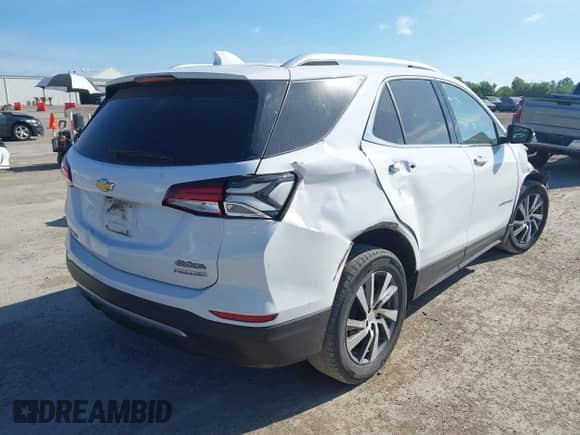 2024 Chevrolet Equinox Premier with VIN 3GNAXNEG9RL252081, listed as a IAAI auction lot 42551045 with 74,564 mi miles and . Bid and sale history available at DreamBid. Image 4.