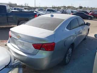 2017 Chevrolet Impala LT z VIN 2G1105S37H9118968, wystawiony jako IAAI lot #41708029 z przebiegiem 157 316 mil mil oraz . Historia ofert i sprzedaży dostępna na DreamBid. Obrazek 4.