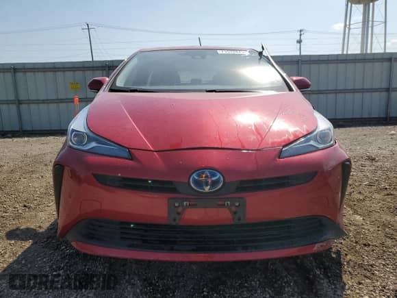 2021 Toyota Prius L Eco with VIN JTDKAMFU9M3134940, listed as a Copart auction lot 71632875 with 34,382 mi miles and Salvage title. Bid and sale history available at DreamBid. Image 5.