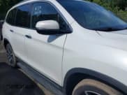 ✅ 2021 Honda Pilot Touring 8-Passenger • VIN: 5FNYF6H95MB091006 • Лот: 42509101. Опубликован ранее на IAAI с пробегом 43 879 миль. Бесплатный доступ к архиву аукционных продаж из США и подробный отчёт об истории автомобиля на DreamBid. Изображение 13.
