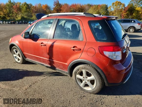 ✅ 2009 Suzuki SX4 Touring AWD • VIN: JS2YB417795101512 • Lot: 87224405. Wystawiony na Copart z przebiegiem 144 763 mil. Bezpłatny archiwum sprzedaży aukcyjnych z USA i szczegółowy raport historii pojazdu na DreamBid. Zdjęcie 2.