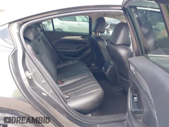 ✅ 2021 Mazda 6 Grand Touring • VIN: JM1GL1TYXM1615684 • Lot: 42690667. Listed on IAAI with 86,360 mi. Free auction sales archive from the USA and detailed vehicle history report at DreamBid. Image 8.