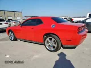 2014 Dodge Challenger SXT z VIN 2C3CDYAG4EH127031, wystawiony jako Copart lot #82451765 z przebiegiem 190 353 mil mil oraz Szkoda całkowita • Salvage title. Historia ofert i sprzedaży dostępna na DreamBid. Obrazek 2.
