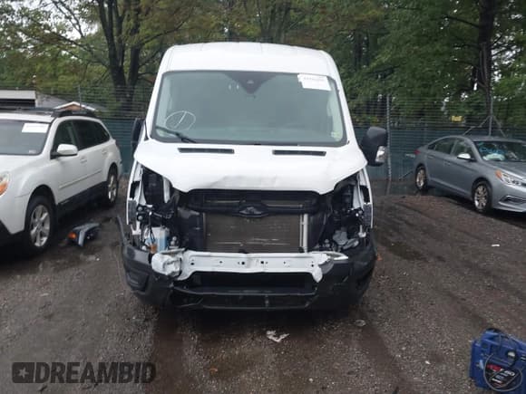 ✅ 2023 Ford Transit Cargo • VIN: 1FTBR1C82PKA03390 • Lot: 43191291. Listed on IAAI with 41,480 mi. Free auction sales archive from the USA and detailed vehicle history report at DreamBid. Image 13.