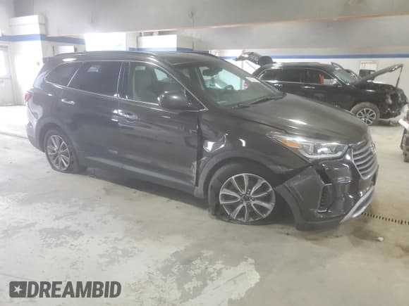 ✅ 2017 Hyundai Santa Fe SE • VIN: KM8SMDHF5HU217105 • Lot: 81822215. Listed on Copart with 118,935 mi. Free auction sales archive from the USA and detailed vehicle history report at DreamBid. Image 4.