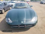 ✅ 2003 Jaguar XK • VIN: SAJDA42C532A36020 • Lot: 60656805. Wystawiony na Copart z przebiegiem 65 020 mil. Bezpłatny archiwum sprzedaży aukcyjnych z USA i szczegółowy raport historii pojazdu na DreamBid. Zdjęcie 5.
