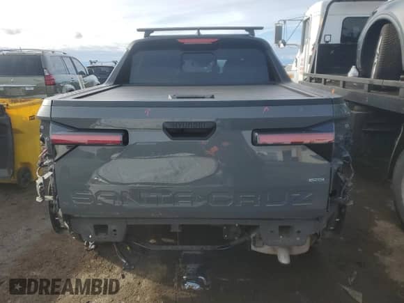 2022 Hyundai Santa Cruz SEL с VIN 5NTJCDAEXNH018773, выставлен на аукционе Copart как лот 88129645 с пробегом 42 545 миль миль и Списание • Salvage title. История ставок и продаж доступна на DreamBid. Изображение 6.