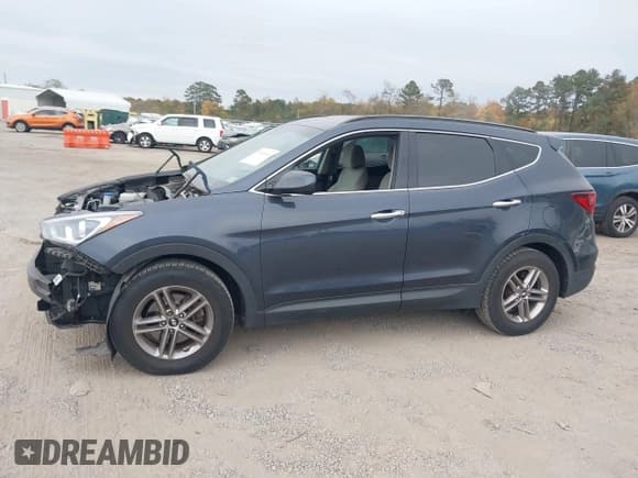 ✅ 2017 Hyundai Santa Fe 2.4L • VIN: 5NMZU3LB6HH027984 • Lot: 43505016. Listed on IAAI with 138,308 mi. Free auction sales archive from the USA and detailed vehicle history report at DreamBid. Image 14.