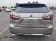 ✅ 2021 Lexus RX 450h • VIN: 2T2HGMDA3MC060208 • Лот: 42163455. Опубликован ранее на IAAI с пробегом 34 167 миль. Бесплатный доступ к архиву аукционных продаж из США и подробный отчёт об истории автомобиля на DreamBid. Изображение 17.