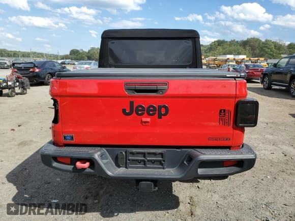 ✅ 2020 Jeep Gladiator Sport S • VIN: 1C6JJTAG0LL133527 • Лот: 70139015. Опубликован ранее на Copart с пробегом 68 964 миль. Бесплатный доступ к архиву аукционных продаж из США и подробный отчёт об истории автомобиля на DreamBid. Изображение 6.