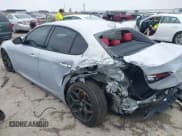 ✅ 2021 Alfa Romeo Giulia • VIN: ZARFAMAN6M7645490 • Lot: 42165037. Listed on IAAI with 57,701 mi. Free auction sales archive from the USA and detailed vehicle history report at DreamBid. Image 3.