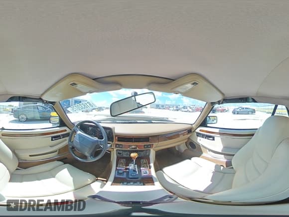 ✅ 1995 Jaguar XJS • VIN: SAJNX2743SC197920 • Лот: 81832075. Опубликован ранее на Copart с пробегом 97 510 миль. Бесплатный доступ к архиву аукционных продаж из США и подробный отчёт об истории автомобиля на DreamBid. Изображение 14.