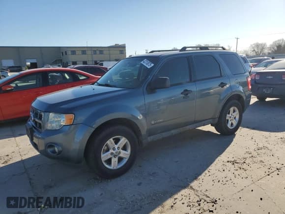 ✅ 2011 Ford Escape Hybrid • VIN: 1FMCU4K30BKC54584 • Lot: 42310875. Wystawiony na Copart z przebiegiem 106 259 mil. Bezpłatny archiwum sprzedaży aukcyjnych z USA i szczegółowy raport historii pojazdu na DreamBid. Zdjęcie 1.