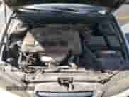 2005 Hyundai Elantra GLS z VIN KMHDN46D35U149616, wystawiony jako Copart lot #81009975 z przebiegiem 233 904 mil mil oraz Szkoda całkowita • Salvage title. Historia ofert i sprzedaży dostępna na DreamBid. Obrazek 11.