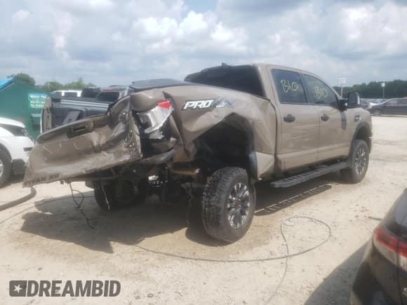 ✅ 2023 Nissan Titan Pro-4X • VIN: 1N6AA1FB4PN111502 • Lot: 60640414. Listed on Copart with 13,254 mi. Free auction sales archive from the USA and detailed vehicle history report at DreamBid. Image 3.