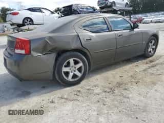 2010 Dodge Charger SXT с VIN 2B3CA3CV4AH242940, выставлен на аукционе Copart как лот 81041074 с пробегом 154 562 миль миль и На запчасти • Non repairable. История ставок и продаж доступна на DreamBid. Изображение 3.