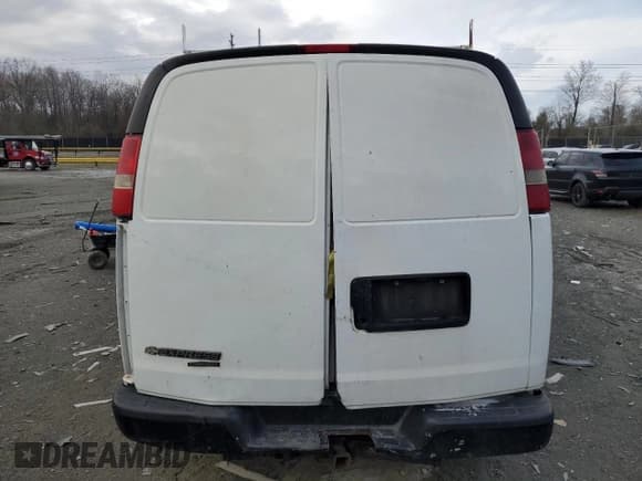 ✅ 2015 Chevrolet Express Cargo • VIN: 1GCWGGCF2F1139631 • Lot: 87158374. Listed on Copart with 202,457 mi. Free auction sales archive from the USA and detailed vehicle history report at DreamBid. Image 6.