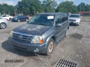 ✅ 2006 Suzuki XL7 • VIN: JS3TY92V964100782 • Lot: 42678396. Listed on IAAI with 218,621 mi. Free auction sales archive from the USA and detailed vehicle history report at DreamBid. Image 2.