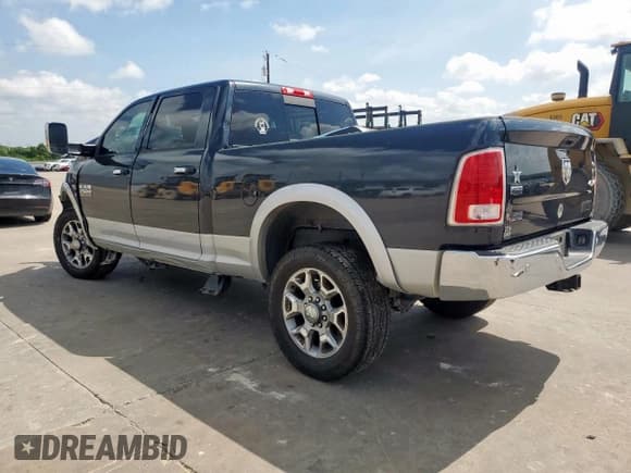 ✅ 2016 Ram 2500 Laramie • VIN: 3C6UR5FJ7GG358522 • Lot: 64729825. Listed on Copart with 96,267 mi. Free auction sales archive from the USA and detailed vehicle history report at DreamBid. Image 2.